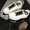 Chanel White and Black Mixed Material Low-Top Sneaker with Suede and CC Logo