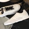 Chanel White and Black Mixed Material Low-Top Sneaker with Suede and CC Logo