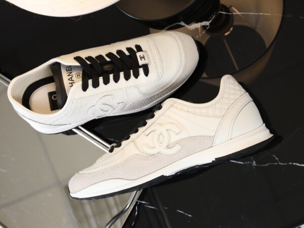 Chanel White and Black Mixed Material Low-Top Sneaker with Suede and CC Logo