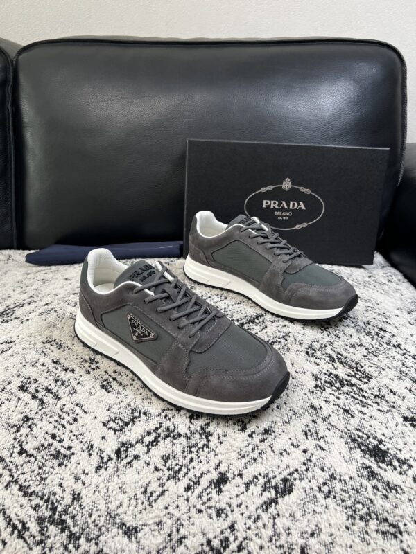 sy_no_55645E36F794D772E80F863542DB22CD_0 Prada Grey Suede Mesh-Spliced Triangle Logo Low-Top Sneaker
