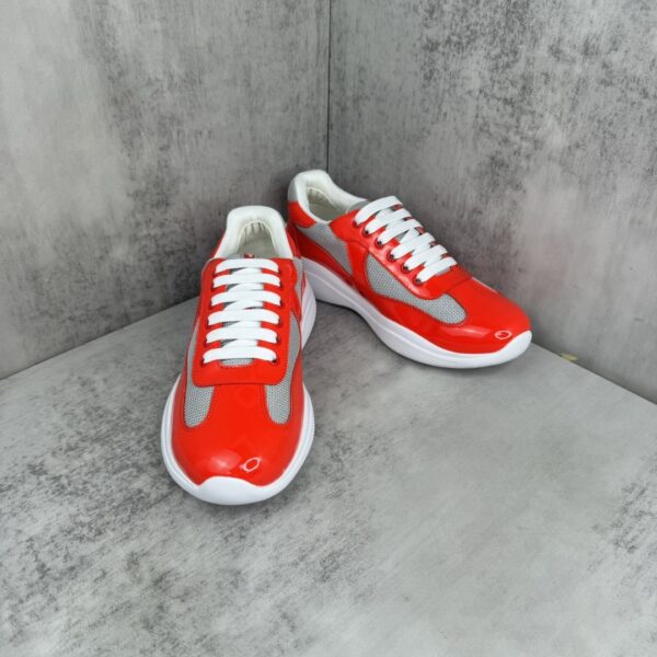 sy_no_556553E3A65AE968D72D0E0E0DF352FF_1 Prada America's Cup Red Patent Mesh Sneaker