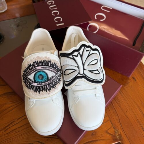 Gucci White Leather Low-Top Sneaker with Embroidered Eye and Bow Flaps