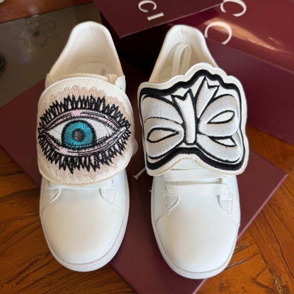 sy_no_5DE36B953E19D4D130FF8C8A0A3E6048_3 Gucci White Leather Low-Top Sneaker with Embroidered Eye and Bow Flaps