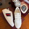 sy_no_5DE36B953E19D4D130FF8C8A0A3E6048_6 Gucci White Leather Low-Top Sneaker with Embroidered Eye and Bow Flaps