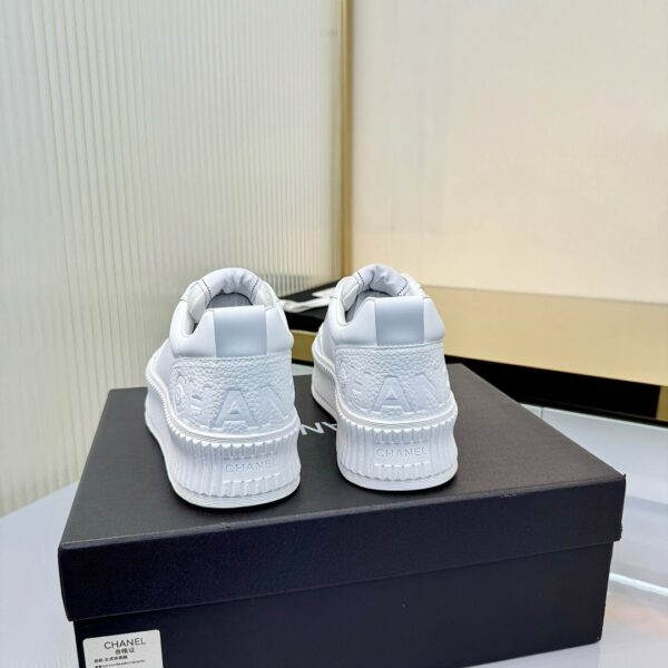 Chanel All-White Leather Platform Low-Top Sneaker with Embossed Heel Logo and Ribbed Sole