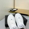 Chanel All-White Leather Platform Low-Top Sneaker with Embossed Heel Logo and Ribbed Sole