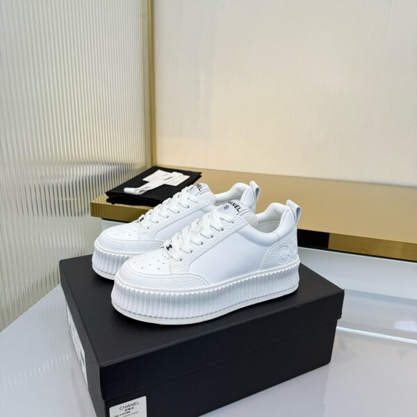Chanel All-White Leather Platform Low-Top Sneaker with Embossed Heel Logo and Ribbed Sole