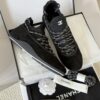Chanel Black Suede and Knit Slip-On Low-Top Sneaker with Speckled Laces and CC Logo