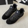 Chanel Black Suede and Knit Slip-On Low-Top Sneaker with Speckled Laces and CC Logo