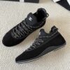 Chanel Black Suede and Knit Slip-On Low-Top Sneaker with Speckled Laces and CC Logo