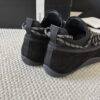 Chanel Black Suede and Knit Slip-On Low-Top Sneaker with Speckled Laces and CC Logo