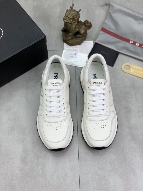 sy_no_6718CC9728BE8F3F6D7BD3F93117451A_1 Prada Off-White Leather Mesh Retro Running Sneaker