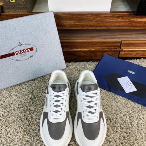 sy_no_67CFDDA6DA2DF1E67CD827184E08E911_0 Prada White Grey Leather Triangle Chunky Sneaker