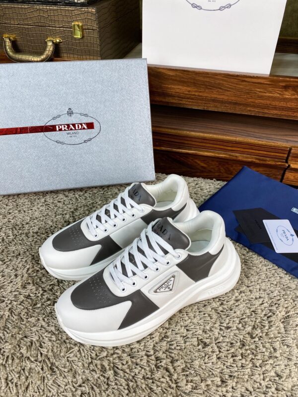 sy_no_67CFDDA6DA2DF1E67CD827184E08E911_1 Prada White Grey Leather Triangle Chunky Sneaker