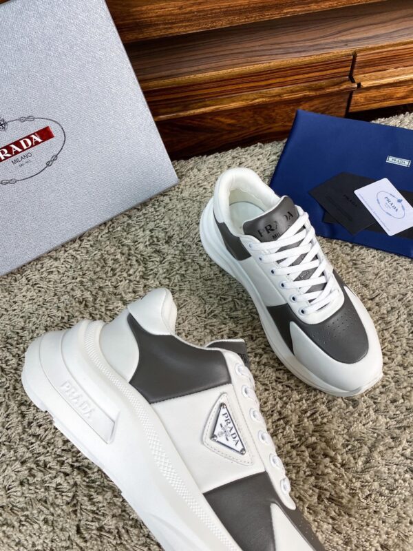sy_no_67CFDDA6DA2DF1E67CD827184E08E911_4 Prada White Grey Leather Triangle Chunky Sneaker