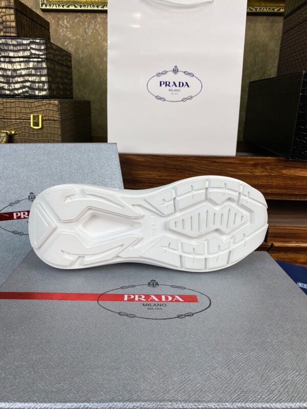 sy_no_67CFDDA6DA2DF1E67CD827184E08E911_7 Prada White Grey Leather Triangle Chunky Sneaker