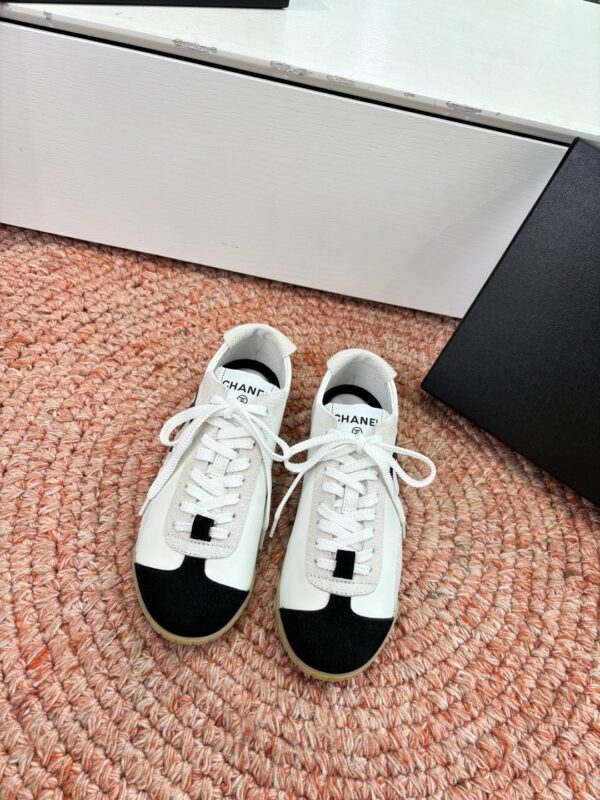 sy_no_6E51CCF1294369F6EDA2B6C5534073EB_0 Chanel White & Black Cap-Toe Low-Top Sneaker with Suede Detailing