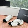 sy_no_6E51CCF1294369F6EDA2B6C5534073EB_1 Chanel White & Black Cap-Toe Low-Top Sneaker with Suede Detailing