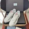 sy_no_6EBBF7D5192BB87716B40E52E28C5156_0 Prada White Patent Silver Mesh Red Label Sneaker