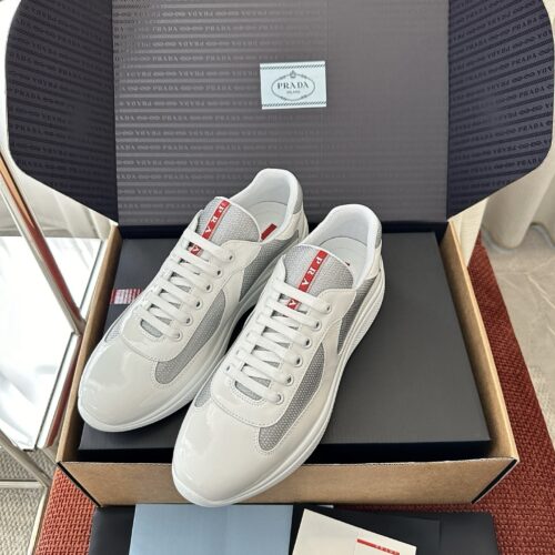 sy_no_6EBBF7D5192BB87716B40E52E28C5156_0 Prada White Patent Silver Mesh Red Label Sneaker