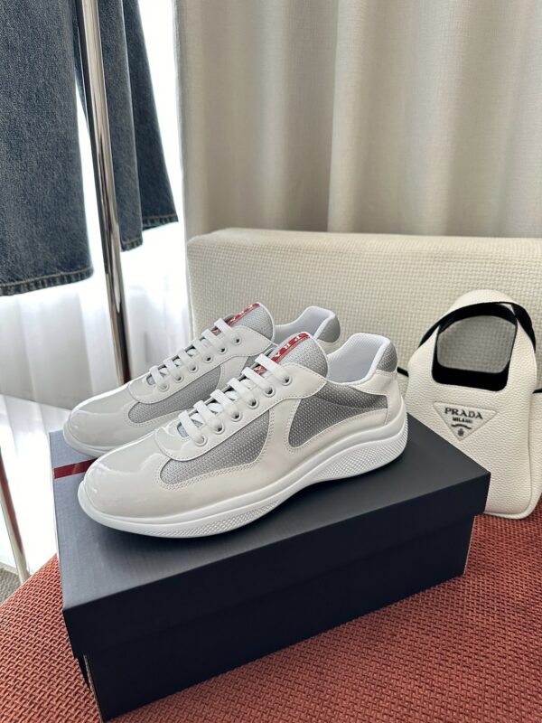 sy_no_6EBBF7D5192BB87716B40E52E28C5156_1 Prada White Patent Silver Mesh Red Label Sneaker