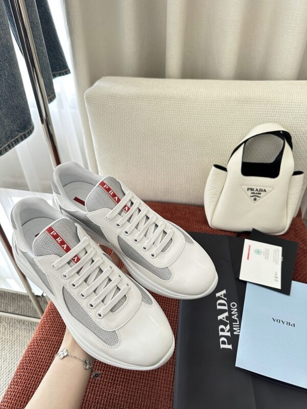 sy_no_6EBBF7D5192BB87716B40E52E28C5156_2 Prada White Patent Silver Mesh Red Label Sneaker