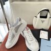 sy_no_6EBBF7D5192BB87716B40E52E28C5156_3 Prada White Patent Silver Mesh Red Label Sneaker