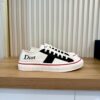sy_no_716ED651878C2C856E9860857D9D38BA_0 Dior White-Black Canvas Low Sneaker