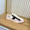 sy_no_716ED651878C2C856E9860857D9D38BA_2 Dior White-Black Canvas Low Sneaker