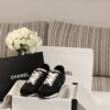 sy_no_7281AD9259070FB5D9F5F654A2AB23D1_0 Chanel Black and White Leather Low-Top Sneaker with Suede Toe Cap and CC Logo