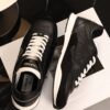 sy_no_7281AD9259070FB5D9F5F654A2AB23D1_4 Chanel Black and White Leather Low-Top Sneaker with Suede Toe Cap and CC Logo