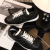 sy_no_7281AD9259070FB5D9F5F654A2AB23D1_6 Chanel Black and White Leather Low-Top Sneaker with Suede Toe Cap and CC Logo