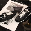 sy_no_7281AD9259070FB5D9F5F654A2AB23D1_7 Chanel Black and White Leather Low-Top Sneaker with Suede Toe Cap and CC Logo