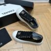 sy_no_751A43FAB37A52E3218B306140ED62C1_2 Chanel Black-White Patent-Leather Low-Top Sneaker with Gold-Tone CC Logo