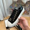 sy_no_751A43FAB37A52E3218B306140ED62C1_4 Chanel Black-White Patent-Leather Low-Top Sneaker with Gold-Tone CC Logo