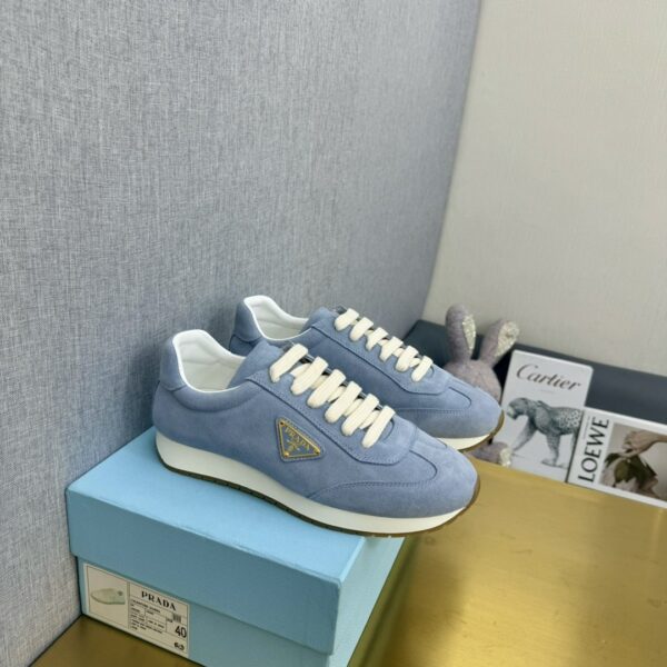 sy_no_774133894272B3D2D2620F328C8A14B6_0 Prada Light Blue Suede Gold Triangle Trainer