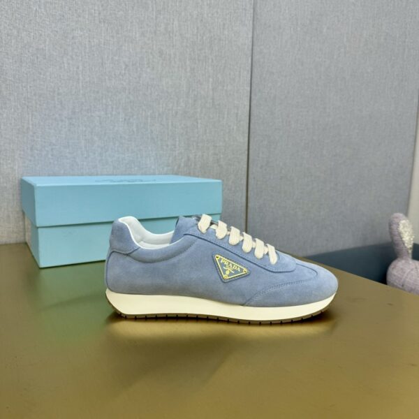 sy_no_774133894272B3D2D2620F328C8A14B6_1 Prada Light Blue Suede Gold Triangle Trainer