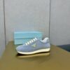sy_no_774133894272B3D2D2620F328C8A14B6_2 Prada Light Blue Suede Gold Triangle Trainer