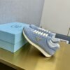 sy_no_774133894272B3D2D2620F328C8A14B6_4 Prada Light Blue Suede Gold Triangle Trainer