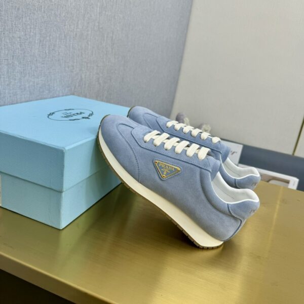 sy_no_774133894272B3D2D2620F328C8A14B6_4 Prada Light Blue Suede Gold Triangle Trainer
