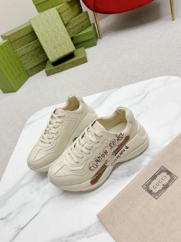 sy_no_7870C34D2272B995D58528D6AC5A952E_4 Gucci Rhyton “Common Sense Is Not That Common” Slogan Sneaker in Off-White