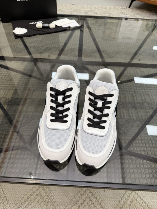 sy_no_7BCDD15F7FA18AE02293535C9264D5C2_2 Chanel White & Grey Chunky Sneaker with Black Laces & CC Logo