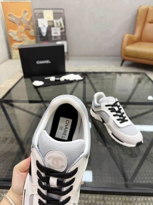 sy_no_7BCDD15F7FA18AE02293535C9264D5C2_6 Chanel White & Grey Chunky Sneaker with Black Laces & CC Logo