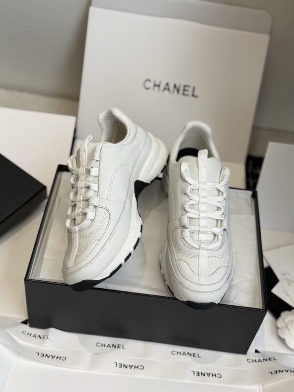 sy_no_7D98149B507AA08F936FFFEFB882303B_6 Chanel All-White Leather Low-Top Sneaker with Embossed CC Logo