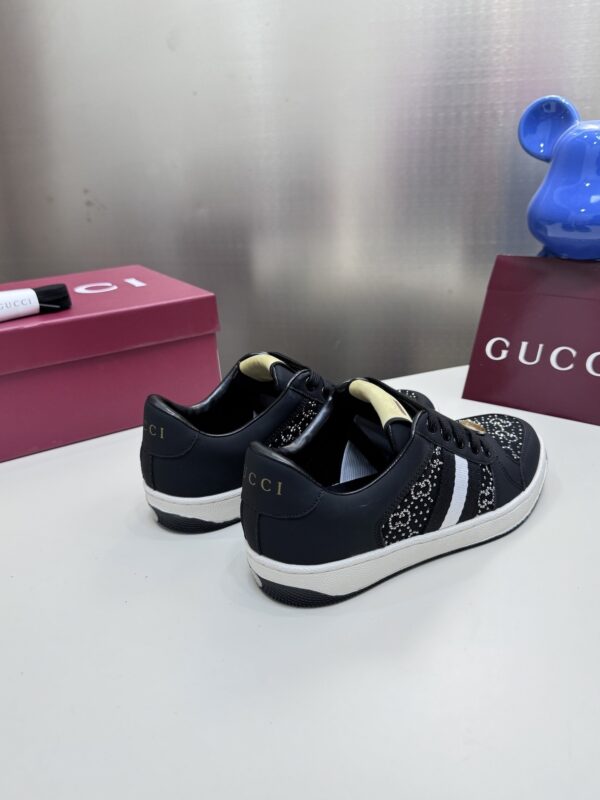 sy_no_7E2649D670336A5A5202289BC64FFA25_2 Gucci Black Crystal-Embellished GG Monogram Sneaker with White Stripe