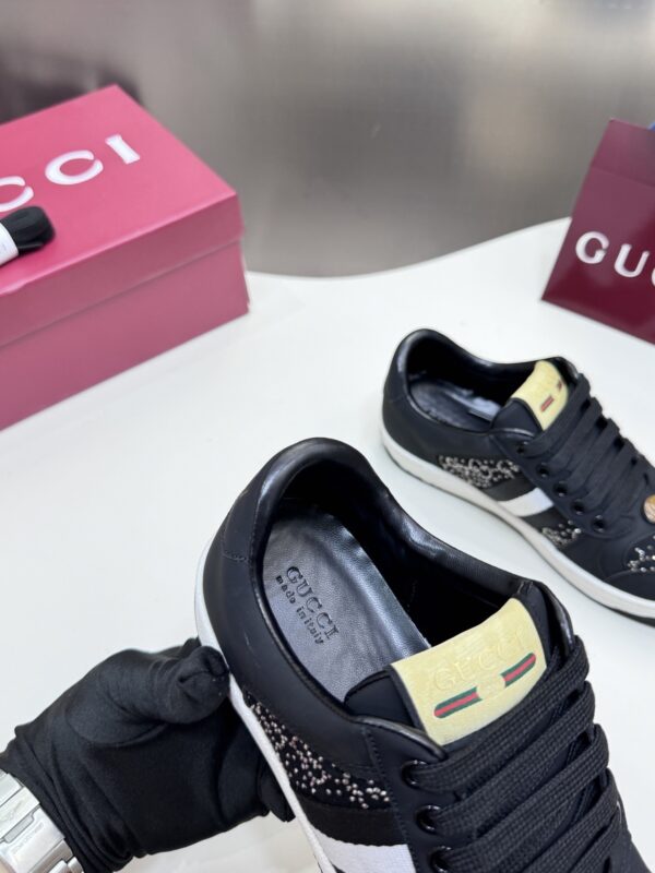 sy_no_7E2649D670336A5A5202289BC64FFA25_3 Gucci Black Crystal-Embellished GG Monogram Sneaker with White Stripe