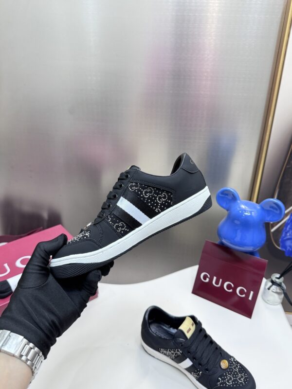 sy_no_7E2649D670336A5A5202289BC64FFA25_6 Gucci Black Crystal-Embellished GG Monogram Sneaker with White Stripe