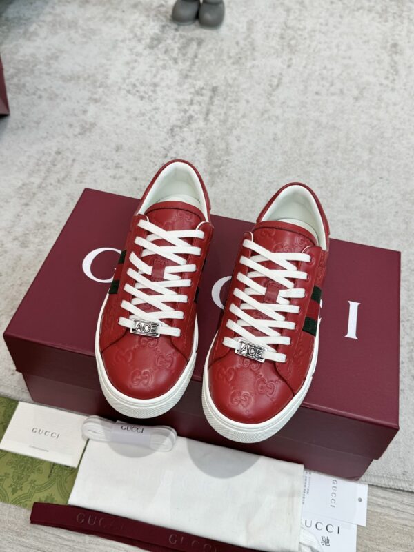 sy_no_7F1D635BC94D8FBAB54A549D0EA07F87_1 Gucci GG Embossed Leather Screener Sneaker in Red