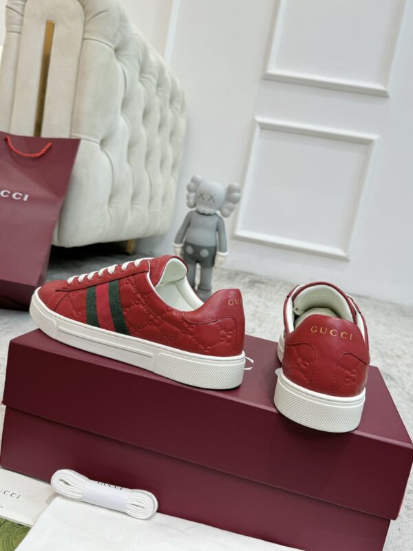 sy_no_7F1D635BC94D8FBAB54A549D0EA07F87_3 Gucci GG Embossed Leather Screener Sneaker in Red