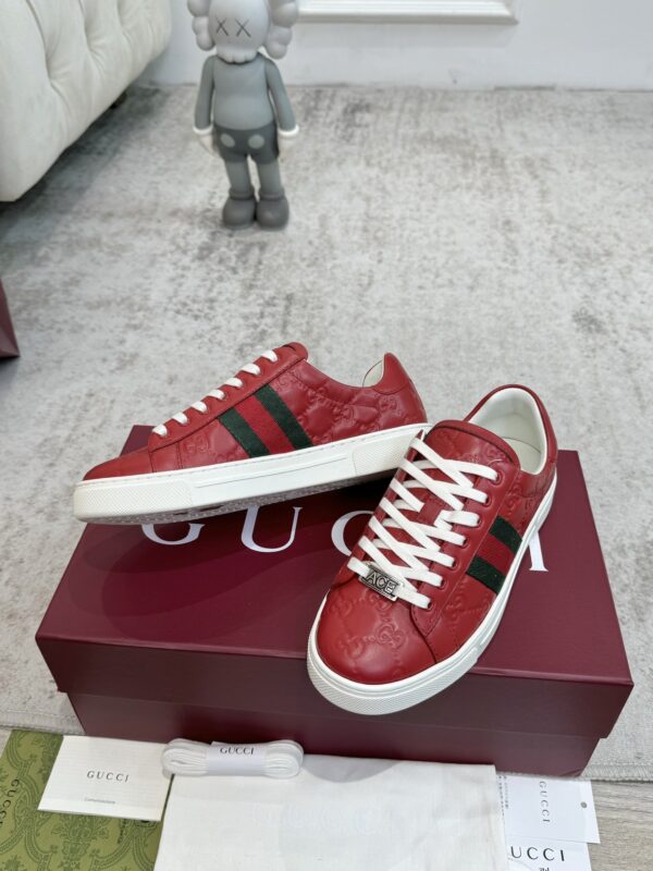 sy_no_7F1D635BC94D8FBAB54A549D0EA07F87_4 Gucci GG Embossed Leather Screener Sneaker in Red